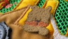 Embroidered and cut bear
