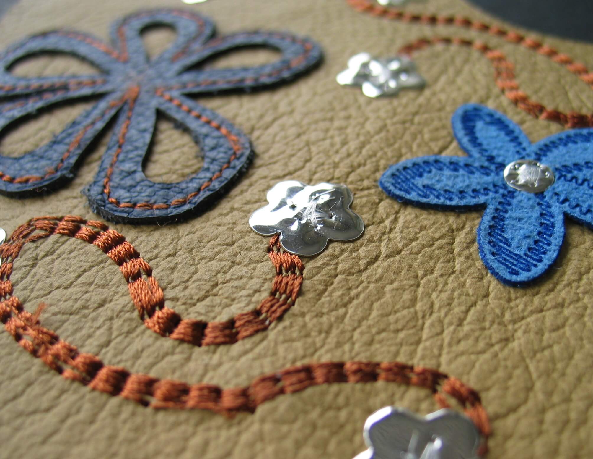 Embroidered and cut flowers